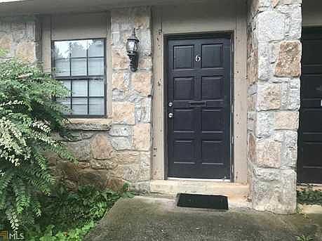 Front door that leads to living room