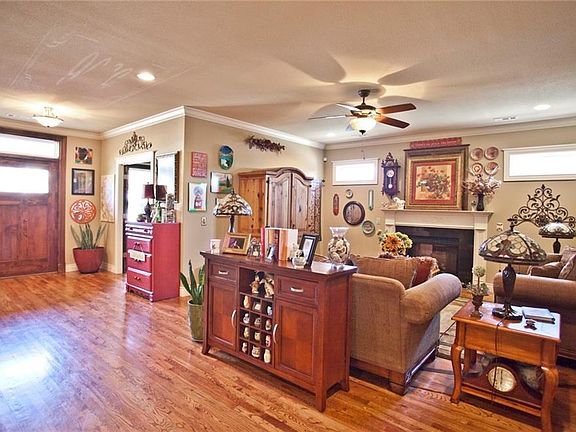 Notice the house number on the glass window above the door is reflected on the ceiling.
