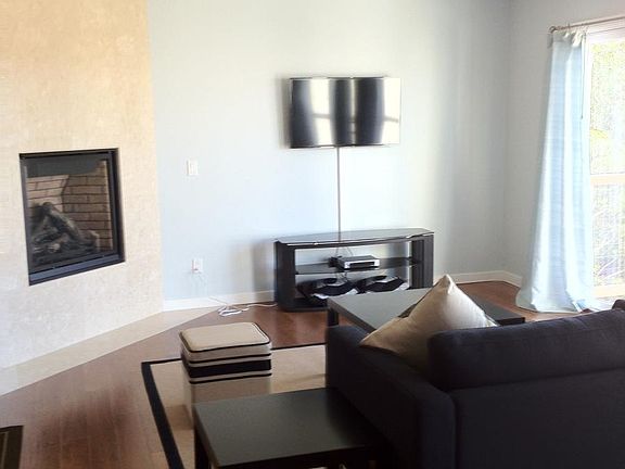 Living Room with Fireplace & TV