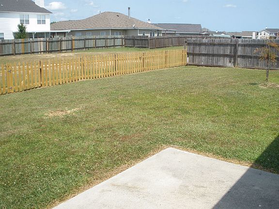 Spacious fenced backyard!