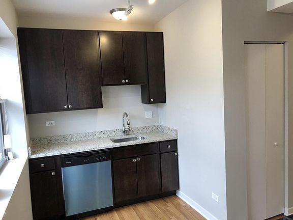 Dishwasher and Sink + Pantry area