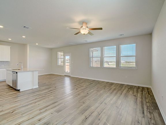 Bring together family and friends in the spacious living and dining areas.