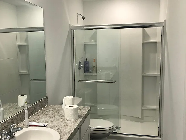 Master bathroom with glass sliding doors