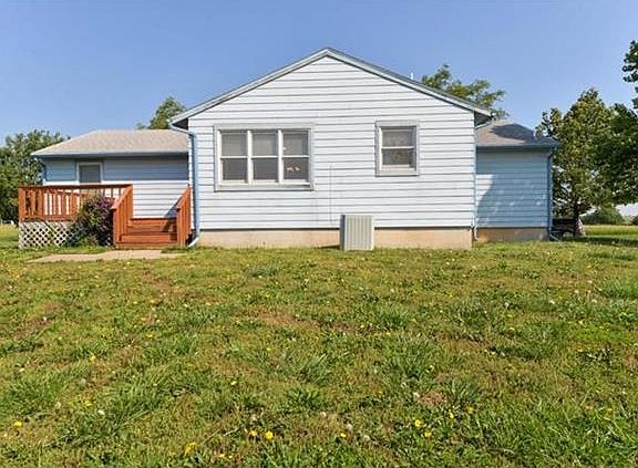 Roomy back deck just off large country kitchen/dining area.