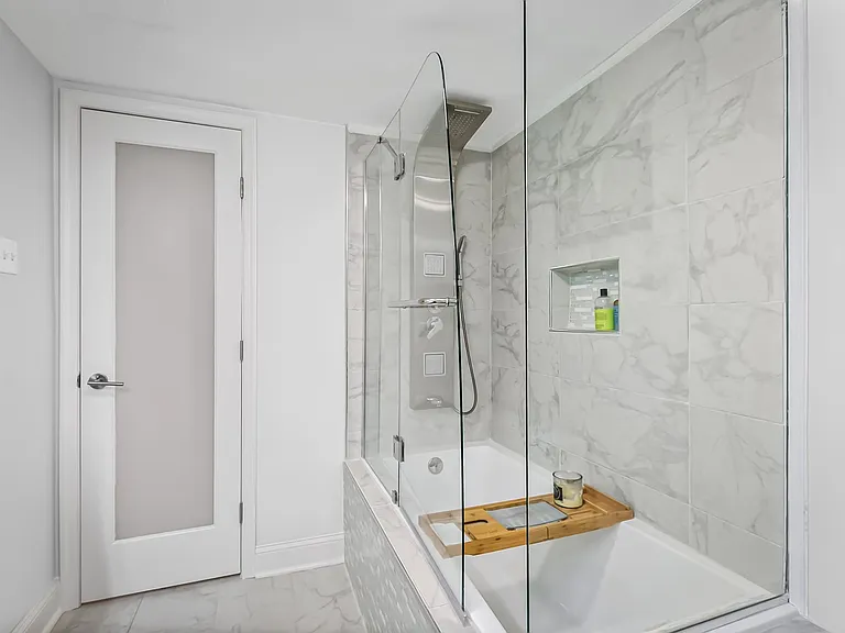 Luxurious and deep soaking tub in lower level bath!