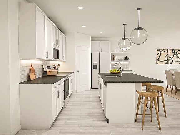 Kitchen with white subway tile backsplash