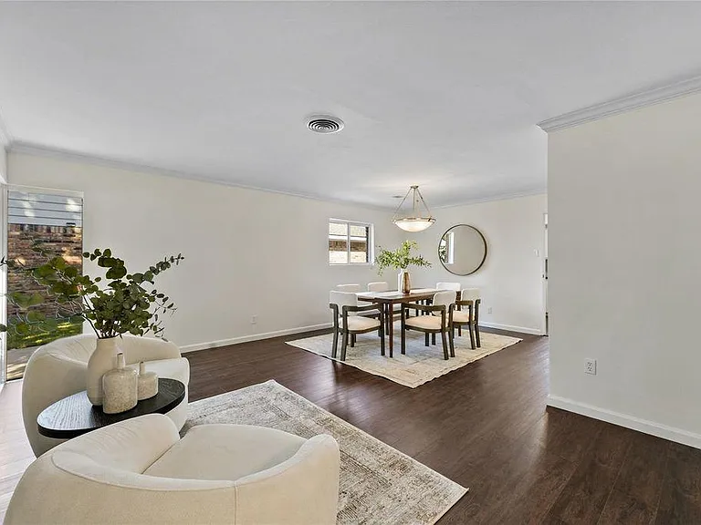 Spacious living room with plenty of natural light.