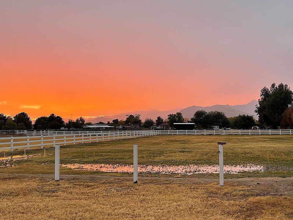 Back acre with white tanks