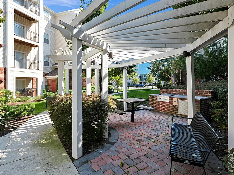 Community barbecue area. Walking paths inside and outside community.