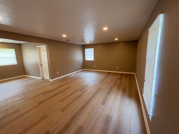 Spacious living room that was once a garage.