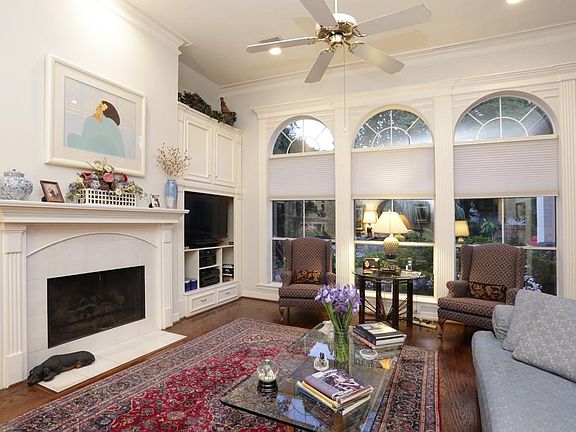 Great Room - Fireplace, built-in bookcase, media center