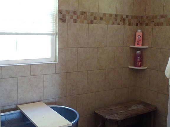 Full shower/bath room (separate from toilet room)