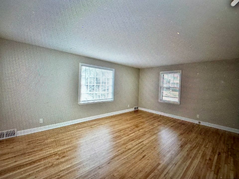 Large Living Room with maple flooring