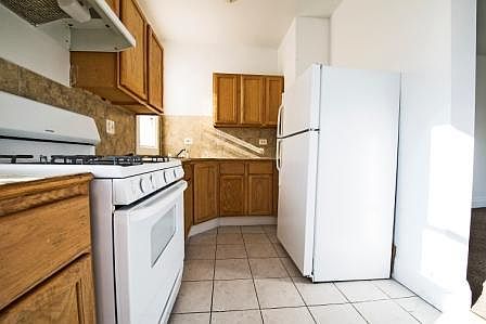 5th image of 6033 S Vernon Ave APT 1