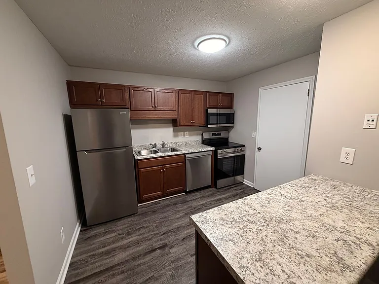 The Brownstone Apartments — Photo 1