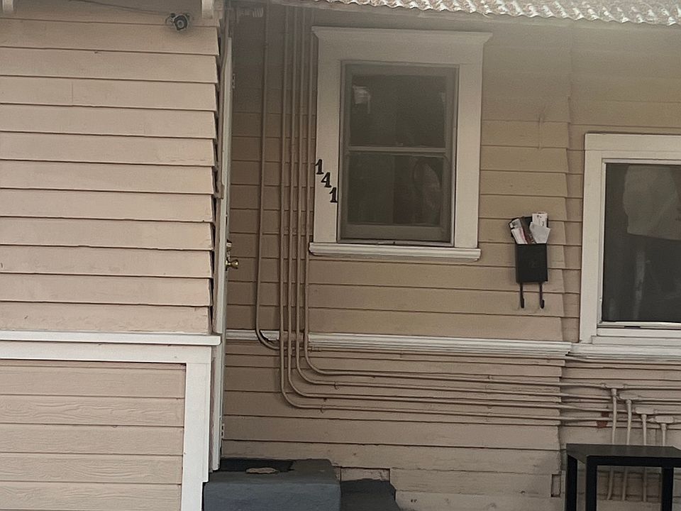 Front of the unit with front yard