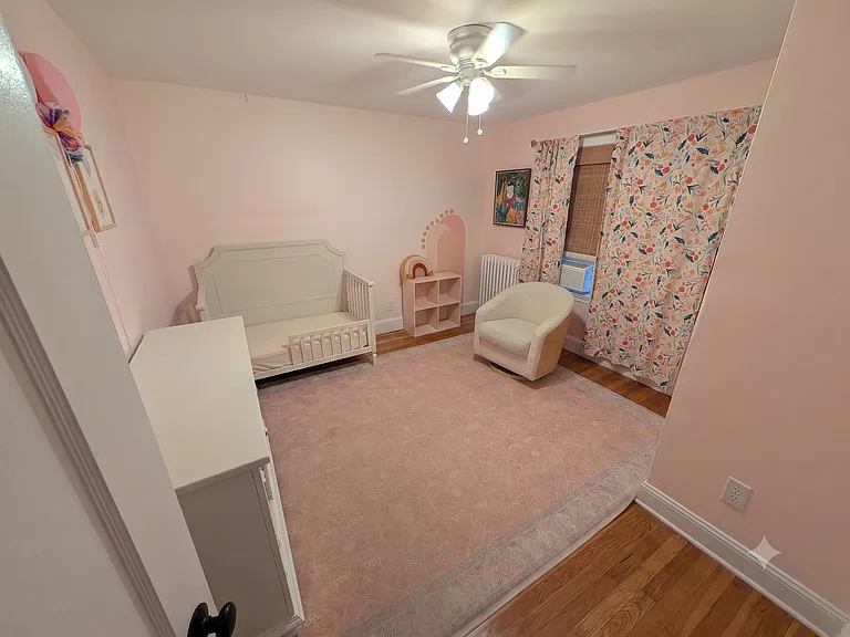 Bedroom 2 with closet. NOTE: Will be painted white.