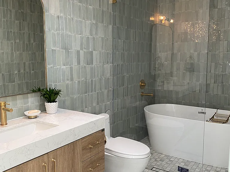 Rain shower head over full size soaking tub.