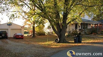 Street view of garage and home