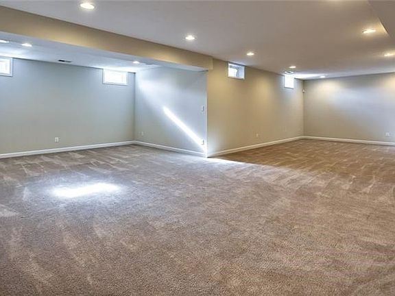 The huge finished lower level offers so much potential to customize based on your specific needs. It is plumbed for a wet bar.