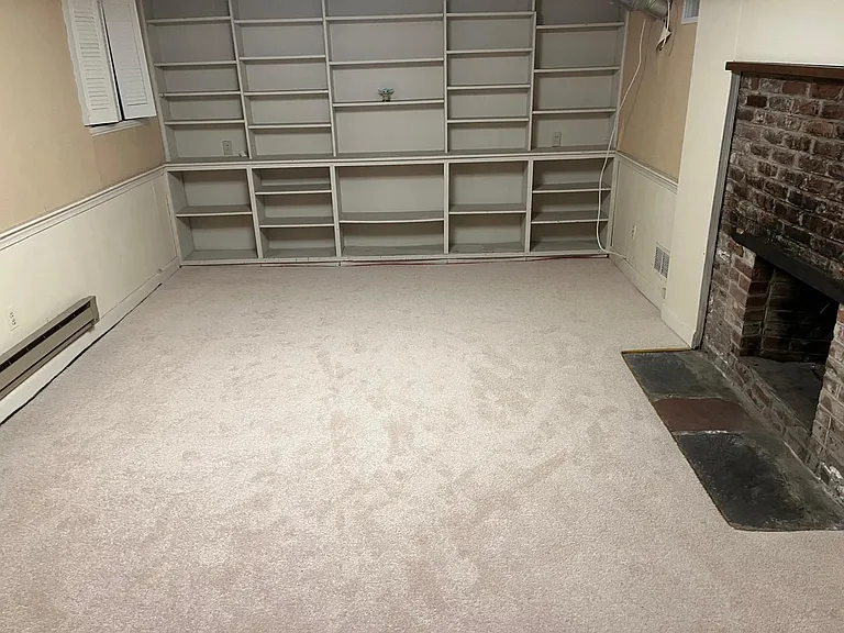 Basement - Full Finish Family room with built in wall storage