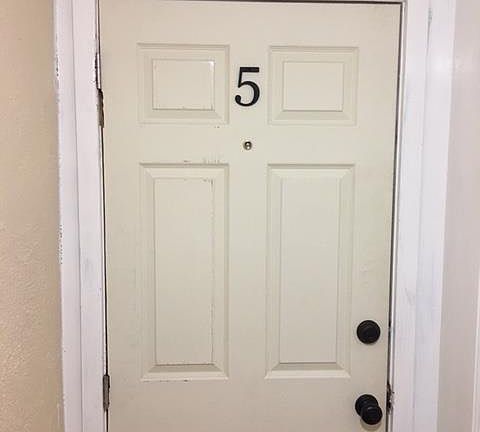 Unit 5 is located at bottom of steps