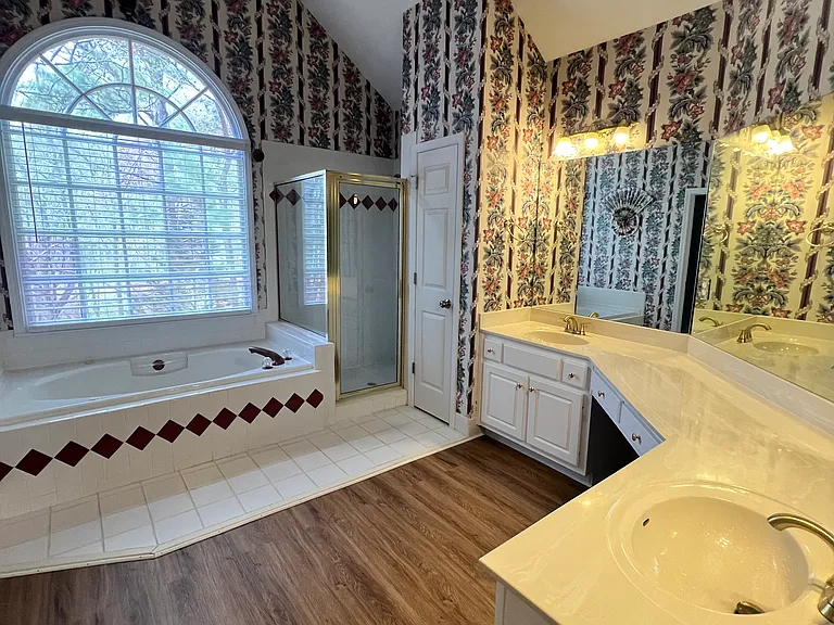 Master bathroom with walk-in closet