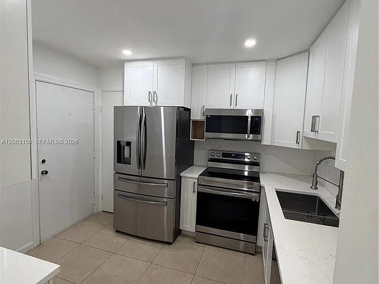 873 NE 195th St #107 — Photo 2