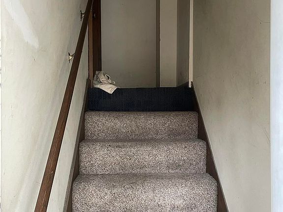 Stairs to the apartment from the front door view