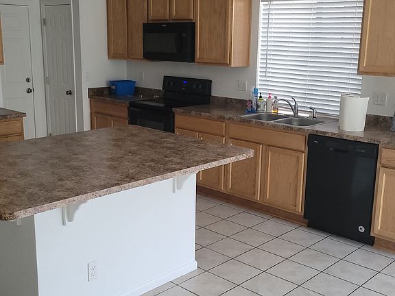 4th image of 18214 E 52nd Pl