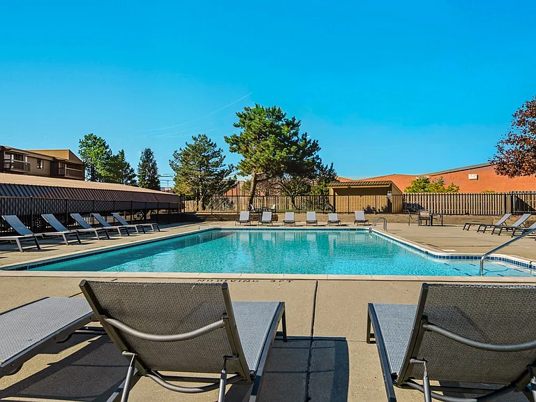 Sparkling Swimming Pool and Sun Deck at Franklin River Apartments in Southfield, MI