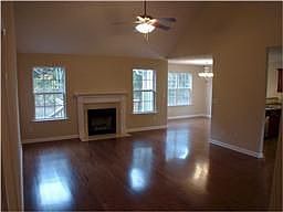 Great room with hardwood floors and fireplace