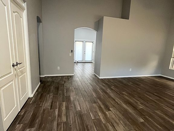 Living room with high vaulted ceilings