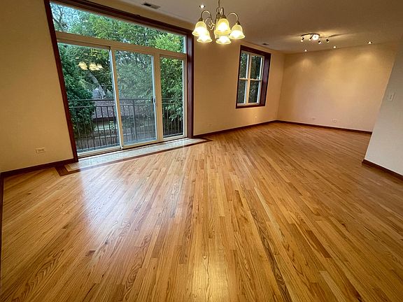 Living Room and Dining Room Area. Open Floor Plan with New Hardwood Floors.