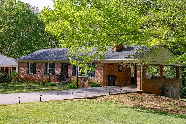 Nice shaded Carport, Large front and rear lawn