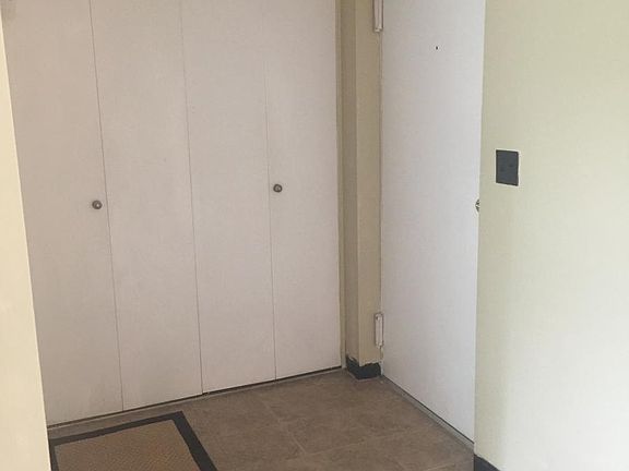 Foyer with hall closet