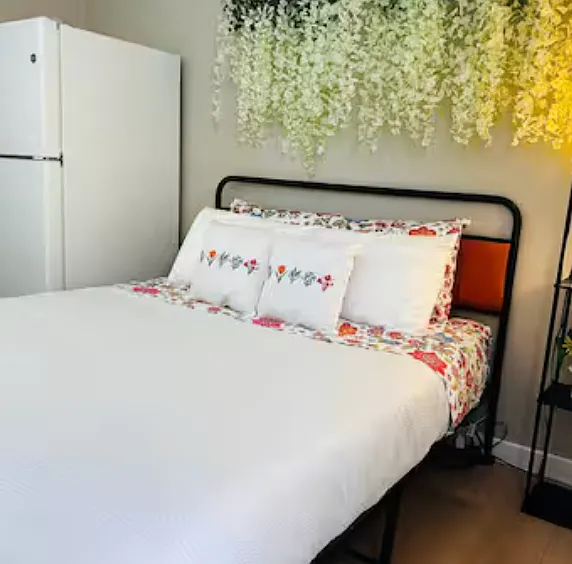 Guest Bedroom 2- Has private entrance from the back yard. Closet , Window Unit for AC.