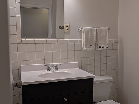 Bathroom with new vainity and lighting.