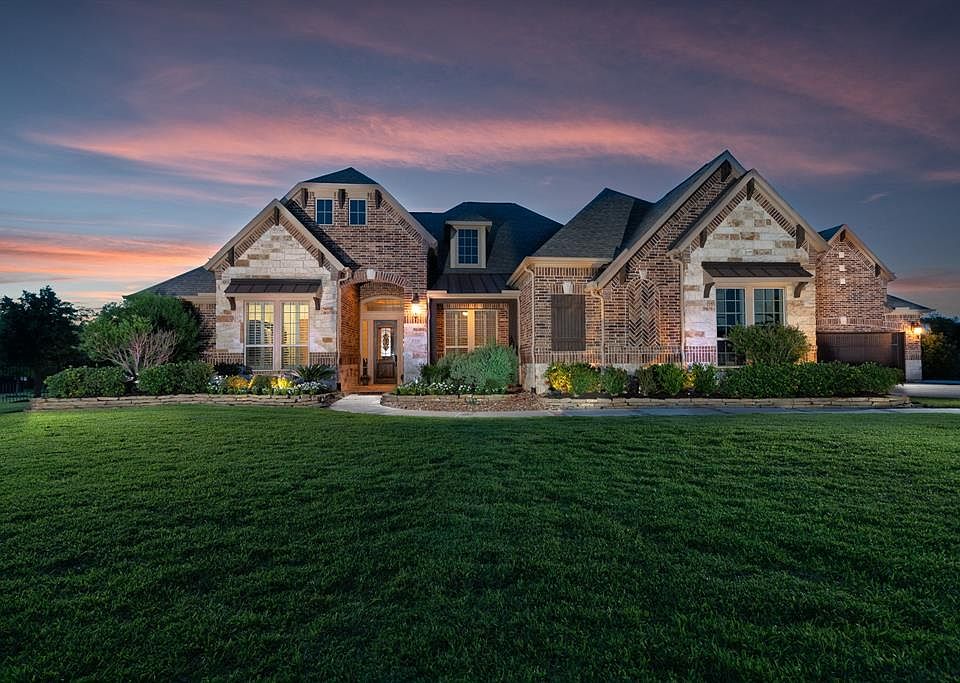 Fabulous 1.5 story Trendmaker home with a peaceful presence and curb appeal that lights up at night and exudes warmth and charm!