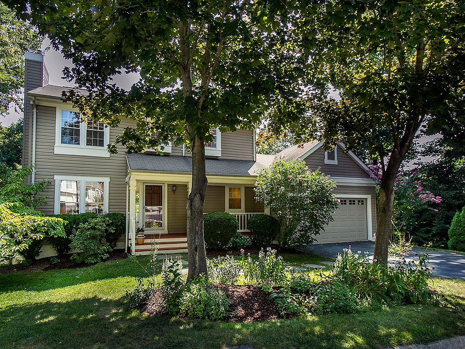 Home with porch on culdesac