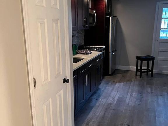 Kitchen (Brand New cabinets, S/S Appliances, & Quartz countertop)
