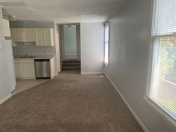 Living room area, nice large windows with plenty of light.
