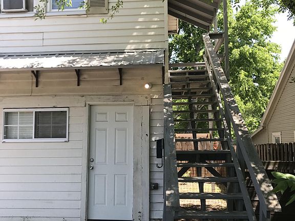 Stairs leading to upstairs unit.