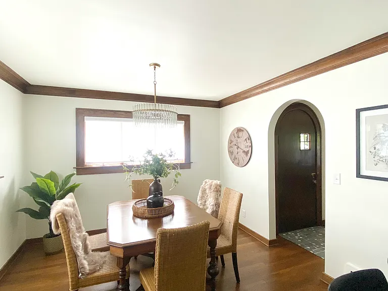 Experience a full view of the airy, light-filled kitchen and dining room, where every detail has been thoughtfully designed. Dining table provides seating for six.