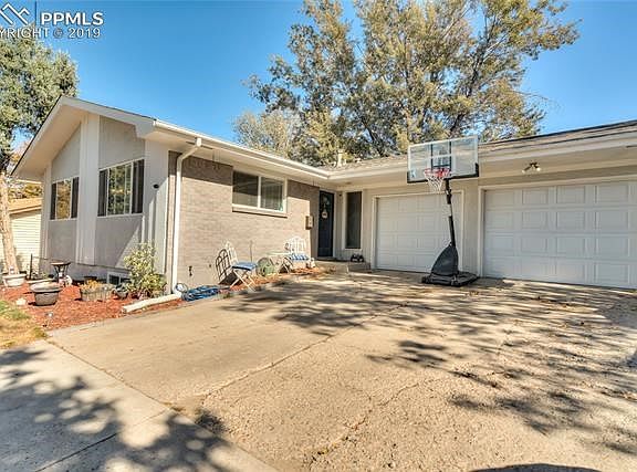 Front view with a nice combination of Stucco, brick and composite siding. new roof in 2017. Updated garage doors, rain gutters, motion sensor lighting and a 460 sq ft garage with a massive driveway!