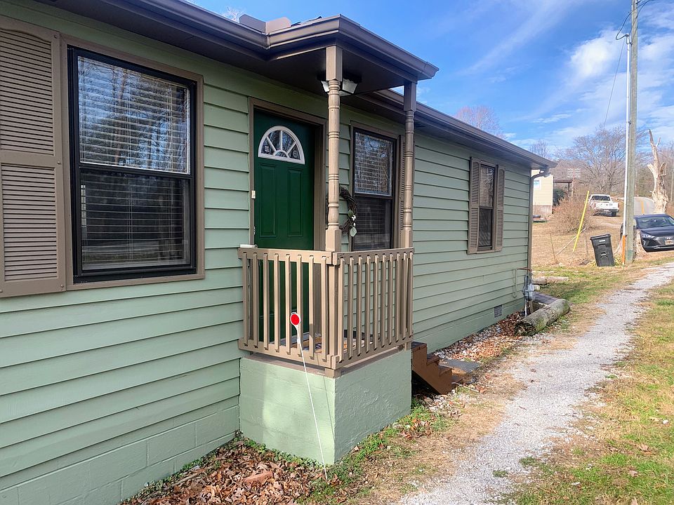 Small entry porch is covered and has 4 steps to arrive to the front door.