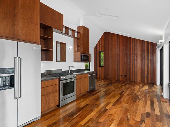 Lots of light, kitchen space and living area all together.