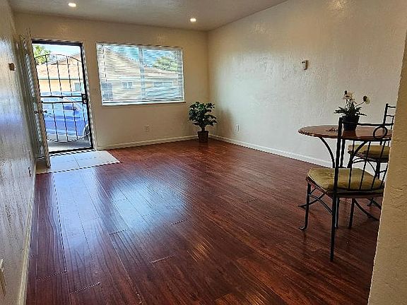 living room, front door and parking right out in front.