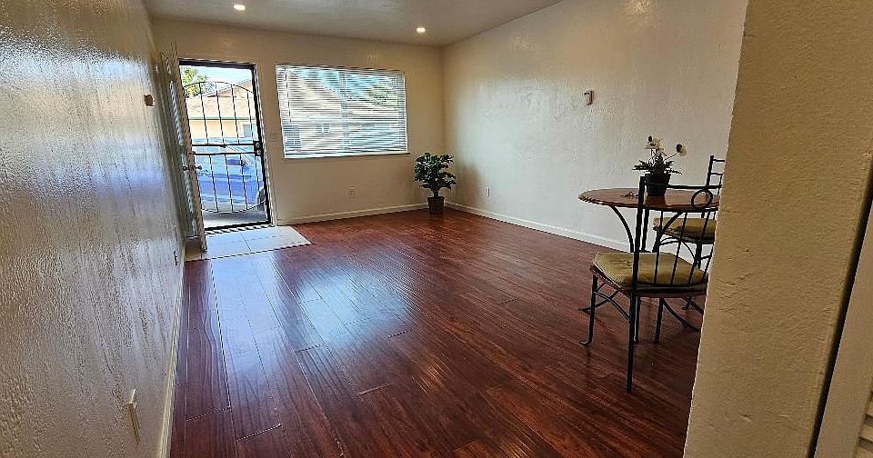 living room, front door and parking right out in front.