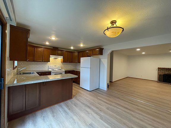 Kitchen, dining area, and living room